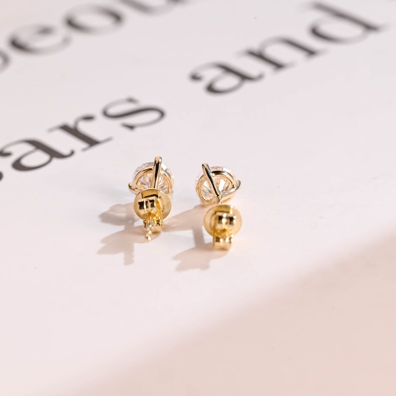 0.70 TCW Round Cut Moissanite Stud Earrings in Gold 9