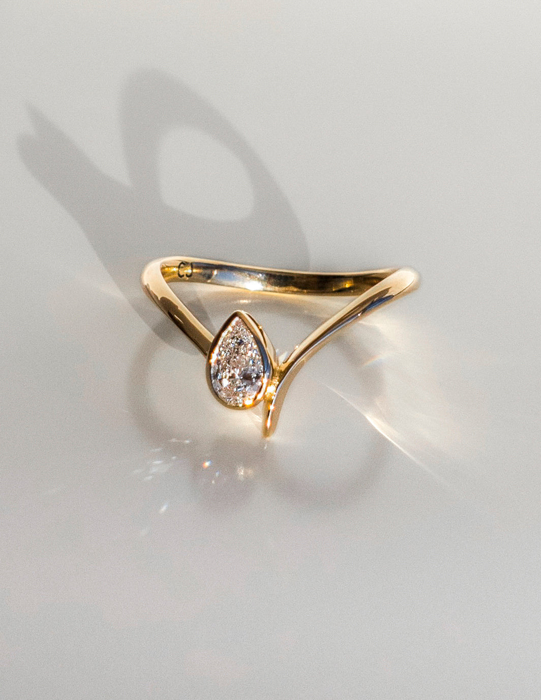 0.45 CT Pear Swirl Solitaire & Bezel Minimal Daily Wear Lab Grown Engagement Ring