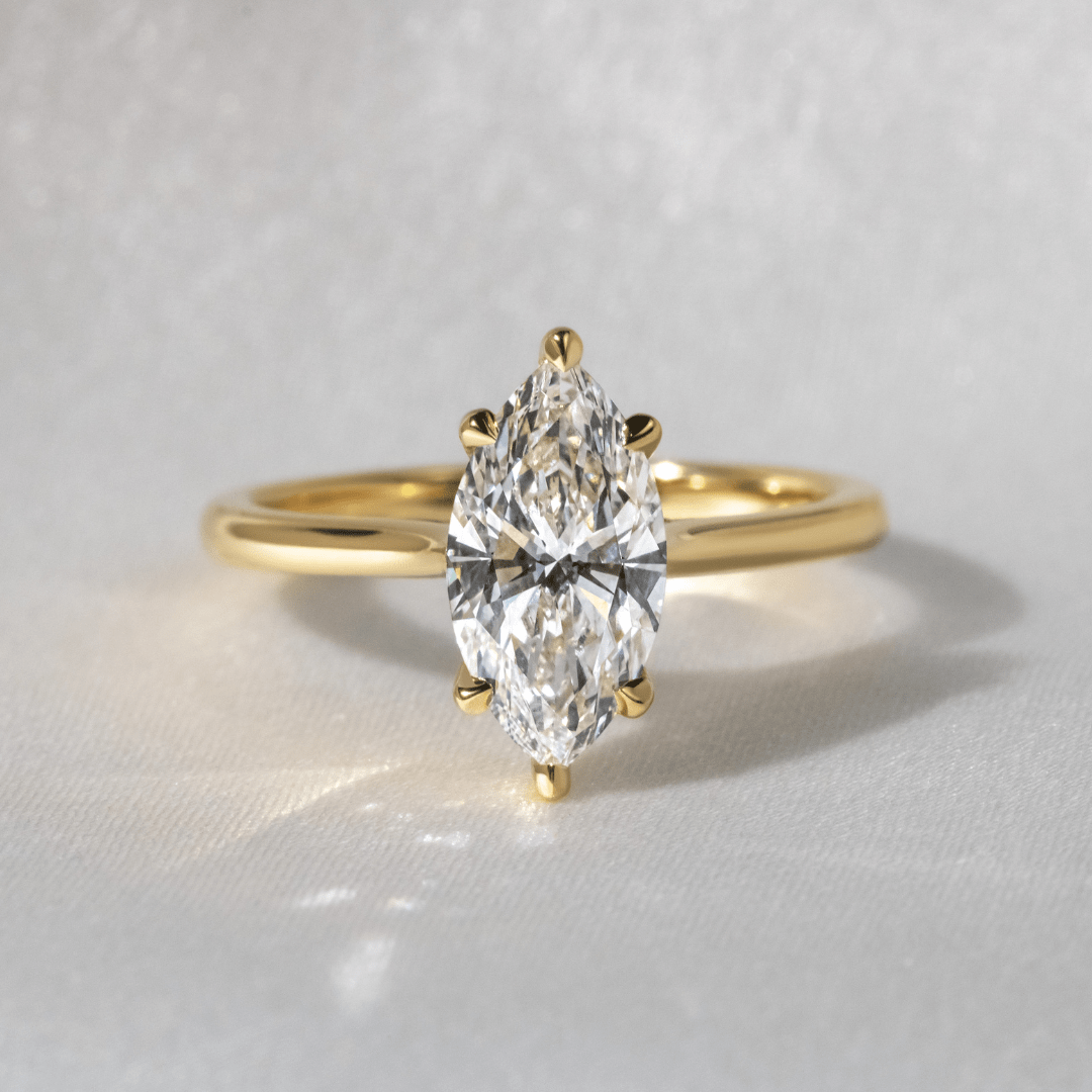 Marquise Shaped Three Stone Lab Grown Diamond Engagement Ring