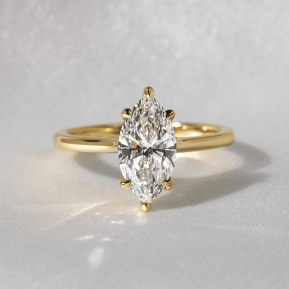 Marquise Shaped Three Stone Lab Grown Diamond Engagement Ring