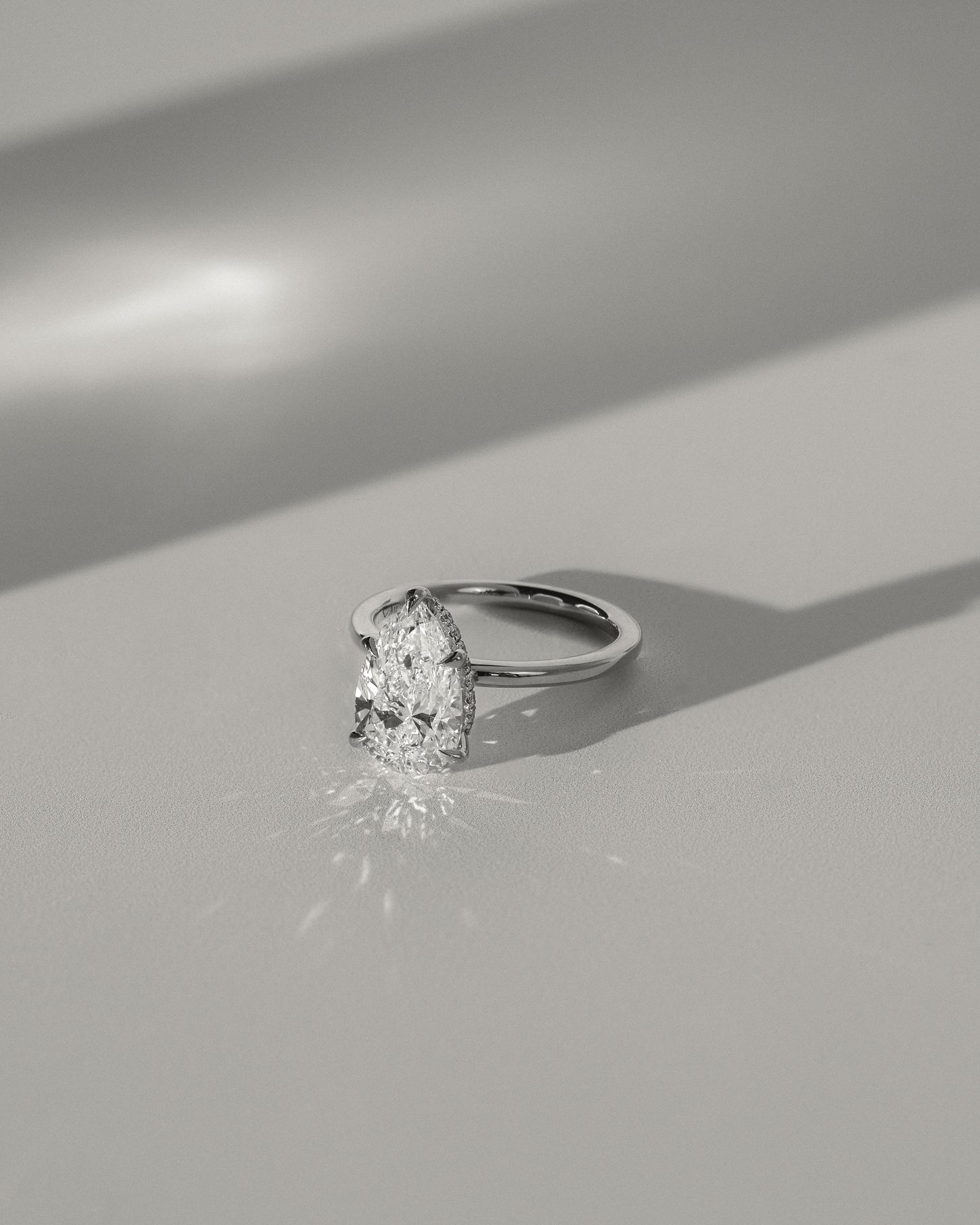 2 CT Pear Cut Hidden Halo Styled Lab Grown Diamond Engagement Ring For Women