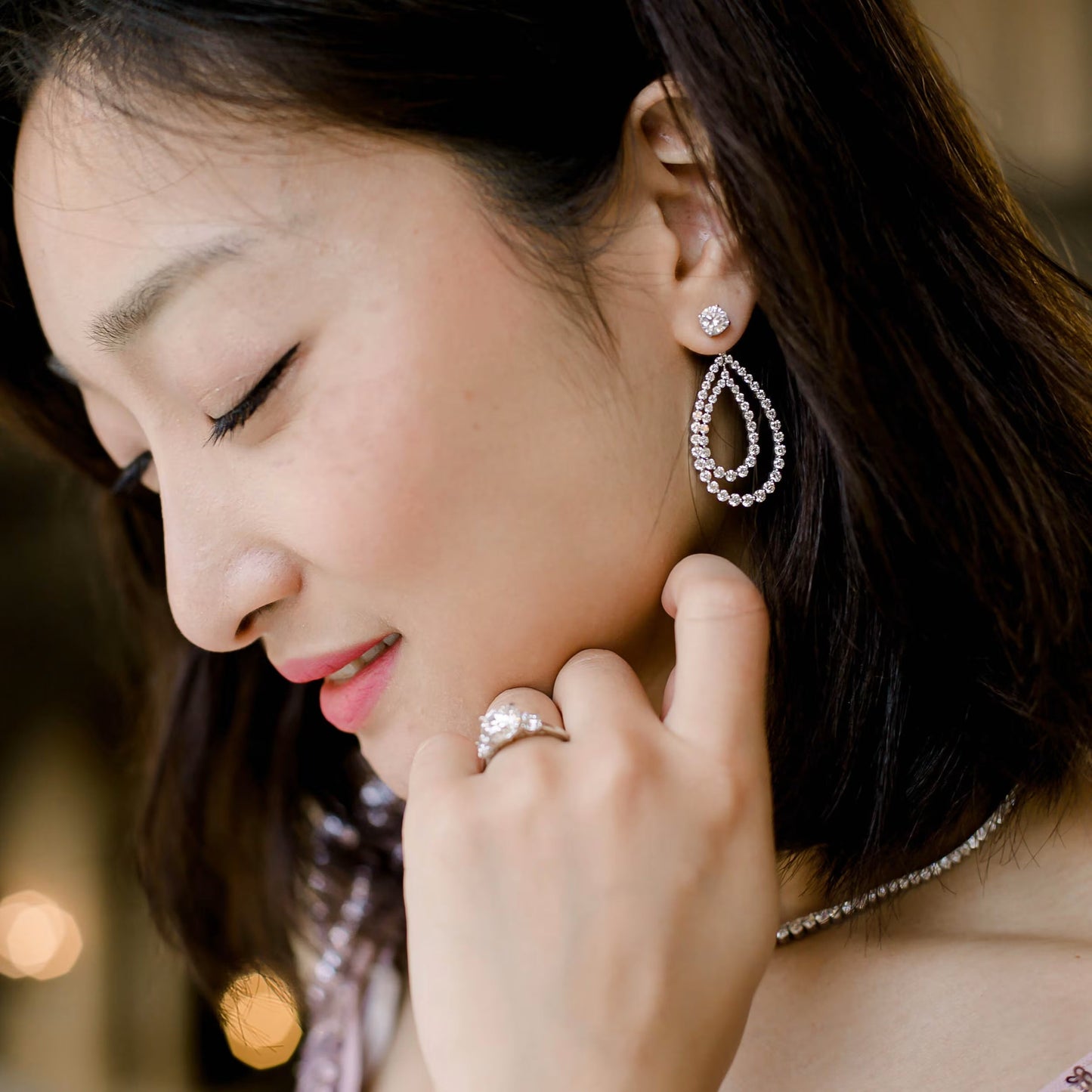 1.10 TCW Round Cut Moissanite Open Double Pear Jacket Earrings in Gold 1