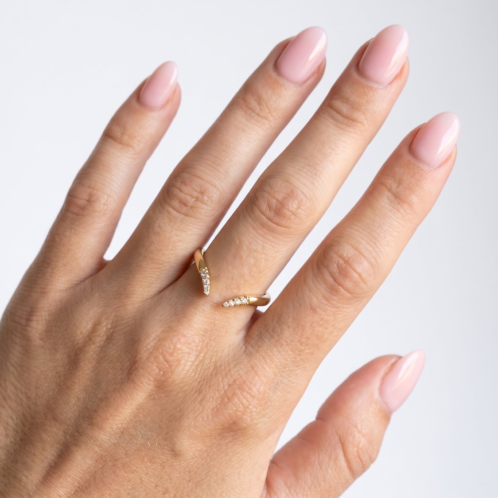 0.13 TCW Round Twisted DEF/VVS Lab Grown Diamond Wedding Band