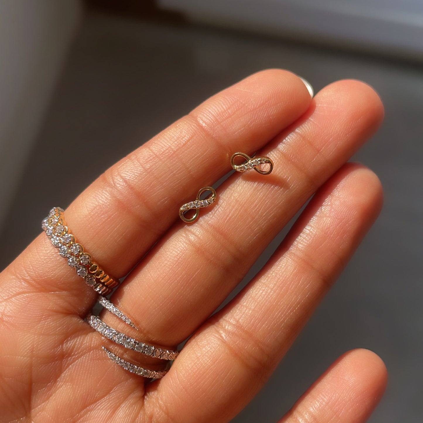 0.30 TCW Round Cut Moissanite Infinity Stud Earrings in Gold 4