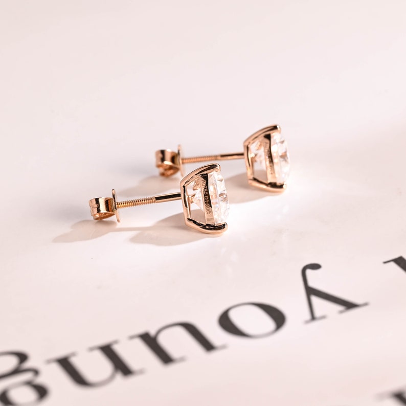 1.0 TCW Heart Cut Moissanite Stud Earrings in Gold 10