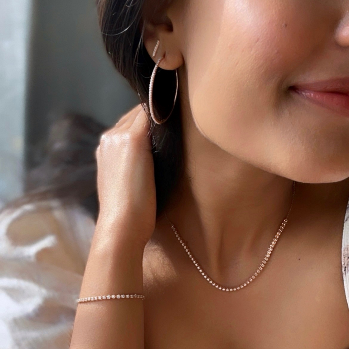 0.70 TCW Round Cut Moissanite Hoops Earrings in Gold 10