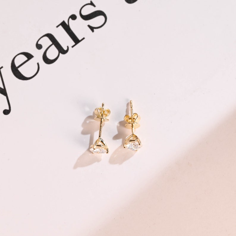 0.70 TCW Round Cut Moissanite Stud Earrings in Gold 8