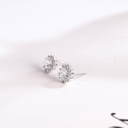1.20 TCW Round Cut Moissanite Halo Stud Earrings in Gold 10