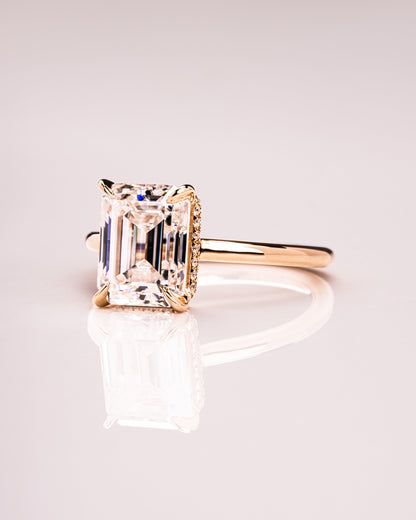 2.30 CT Emerald Cut Lab Grown Diamond Engagement Ring With Hidden Halo Setting