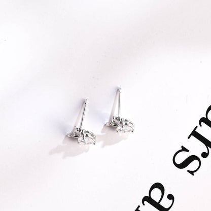 0.70 TCW Round Cut Moissanite Stud Earrings in Gold 9