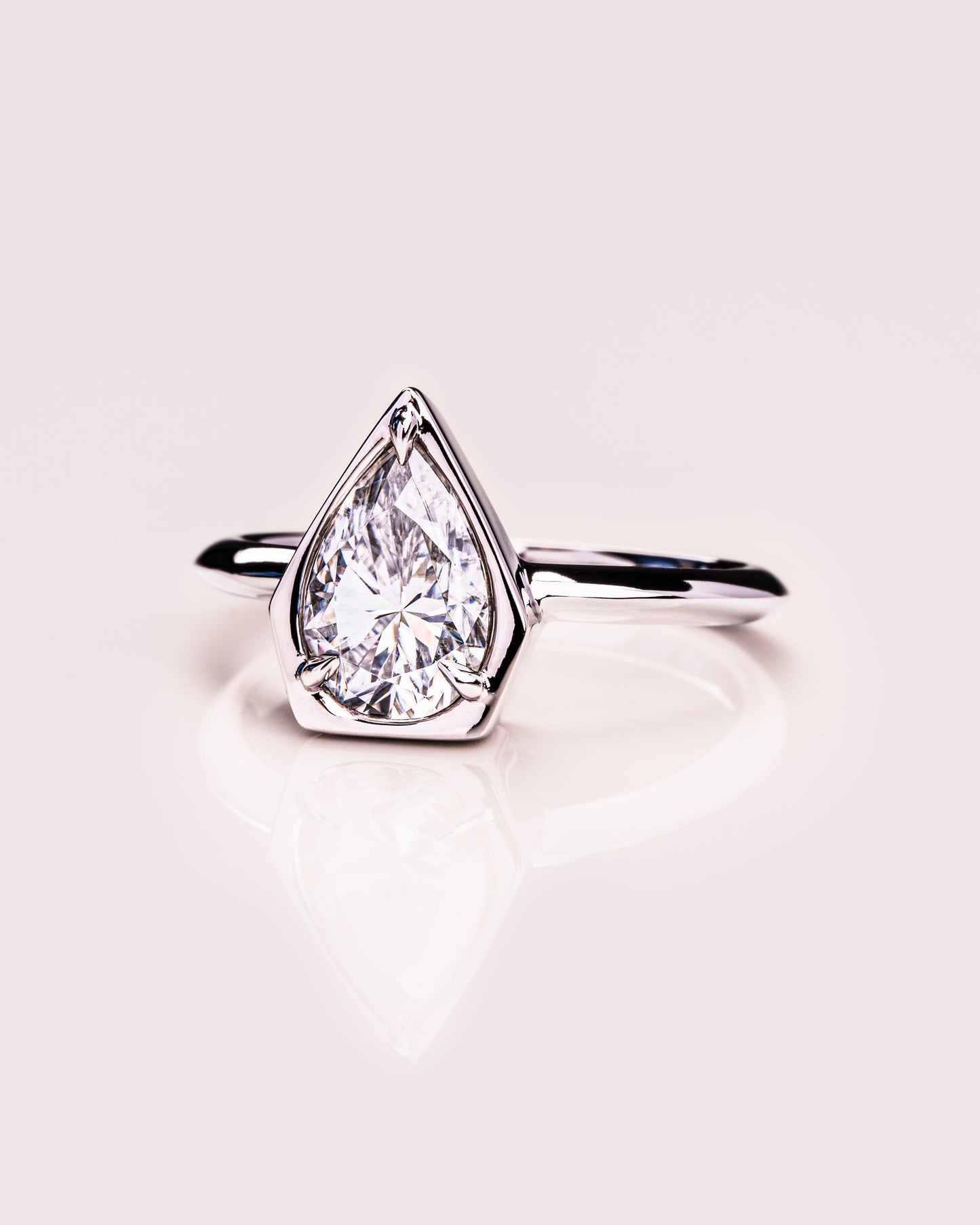 1.33 CT Pear Cut Bezel Solitaire Lab Grown Diamond Engagement Ring
