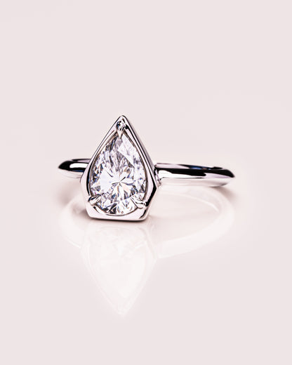 1.33 CT Pear Cut Bezel Solitaire Lab Grown Diamond Engagement Ring