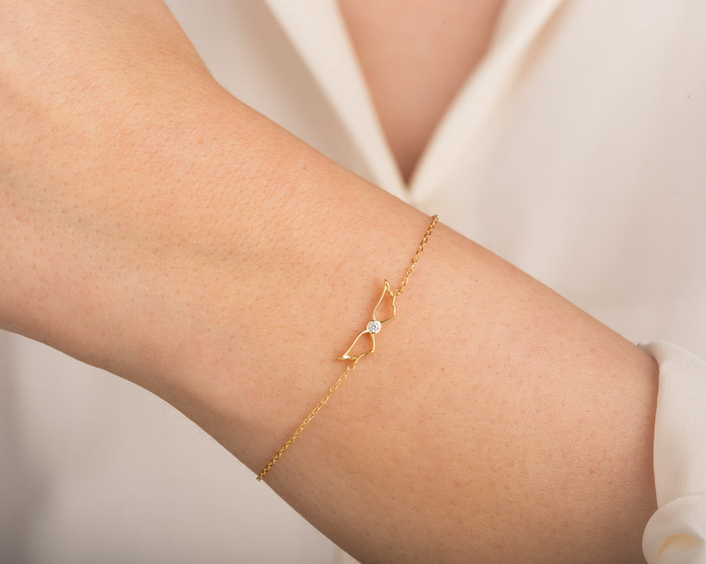 0.02 TCW Round Lab Grown Diamond Wing Shaped Charm Bracelet