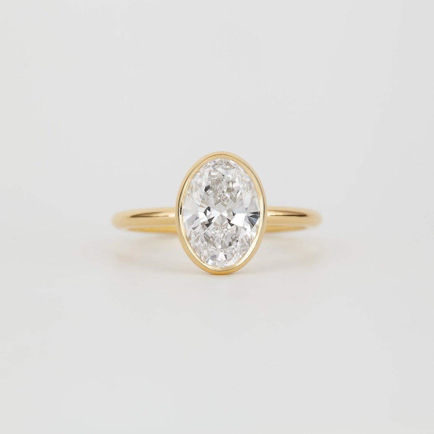 2.0 CT Oval Shaped Bezel Lab Grown Diamond Engagement Ring