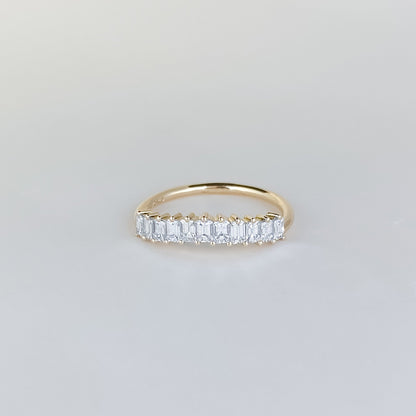 0.68 TCW Emerald Stones Curved Lab Grown Diamond Wedding Band