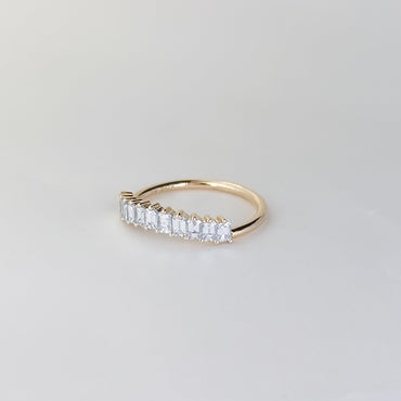 0.68 TCW Emerald Stones Curved Lab Grown Diamond Wedding Band