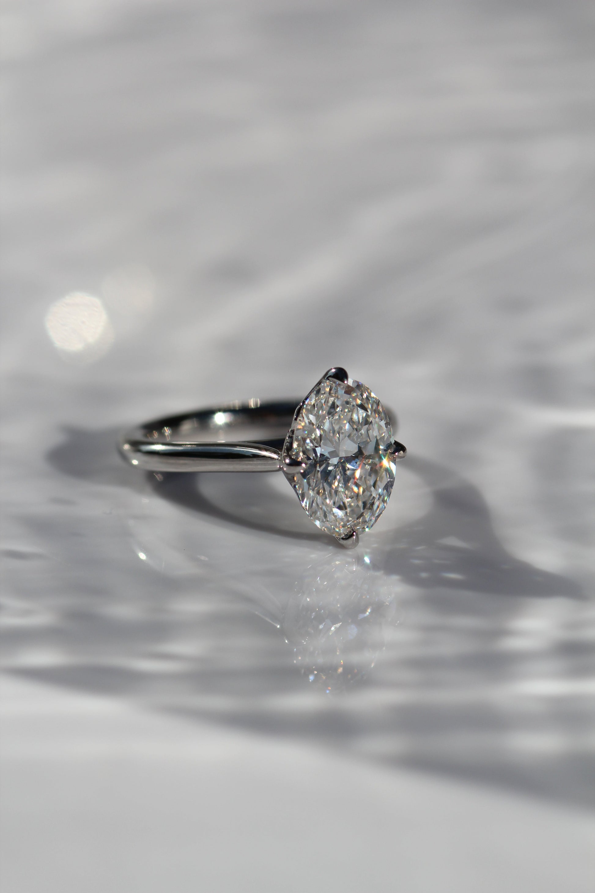 Marquise Shaped Three Stone Lab Grown Diamond Engagement Ring