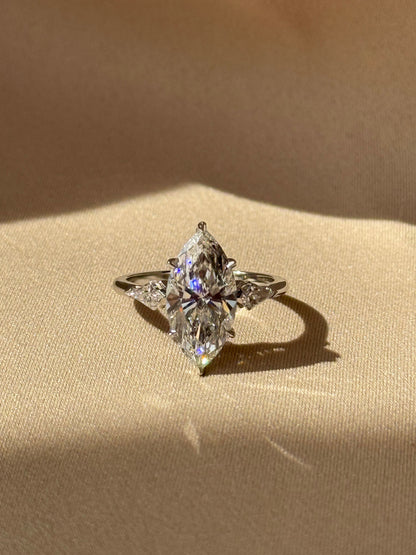 Marquise Shaped Three Stone Lab Grown Diamond Engagement Ring