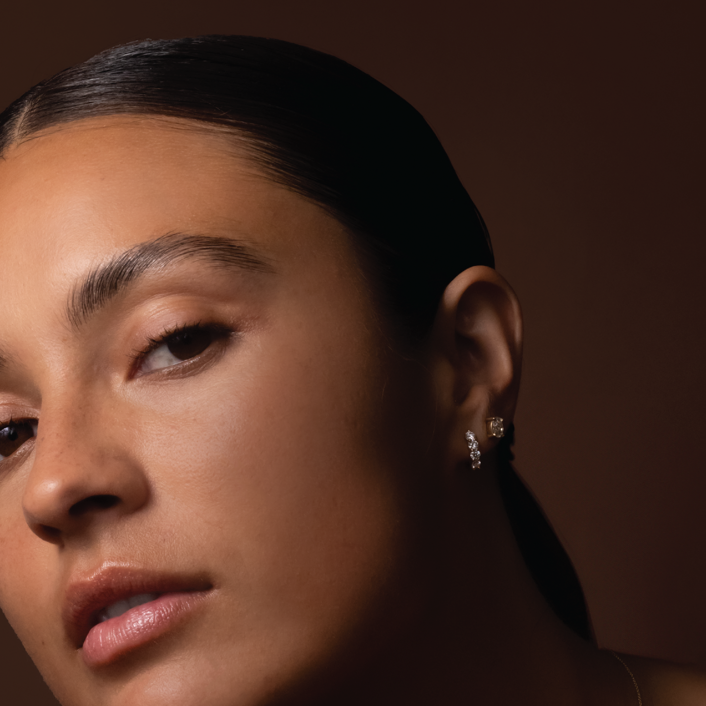 0.50 TCW Oval Cut Moissanite Stud Earrings in Gold