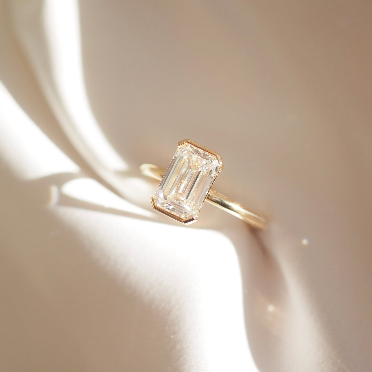 2 CT Emerald Cut Half Bezel Lab Grown Diamond Engagement Ring
