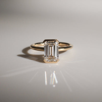 2 CT Emerald Cut Half Bezel Lab Grown Diamond Engagement Ring