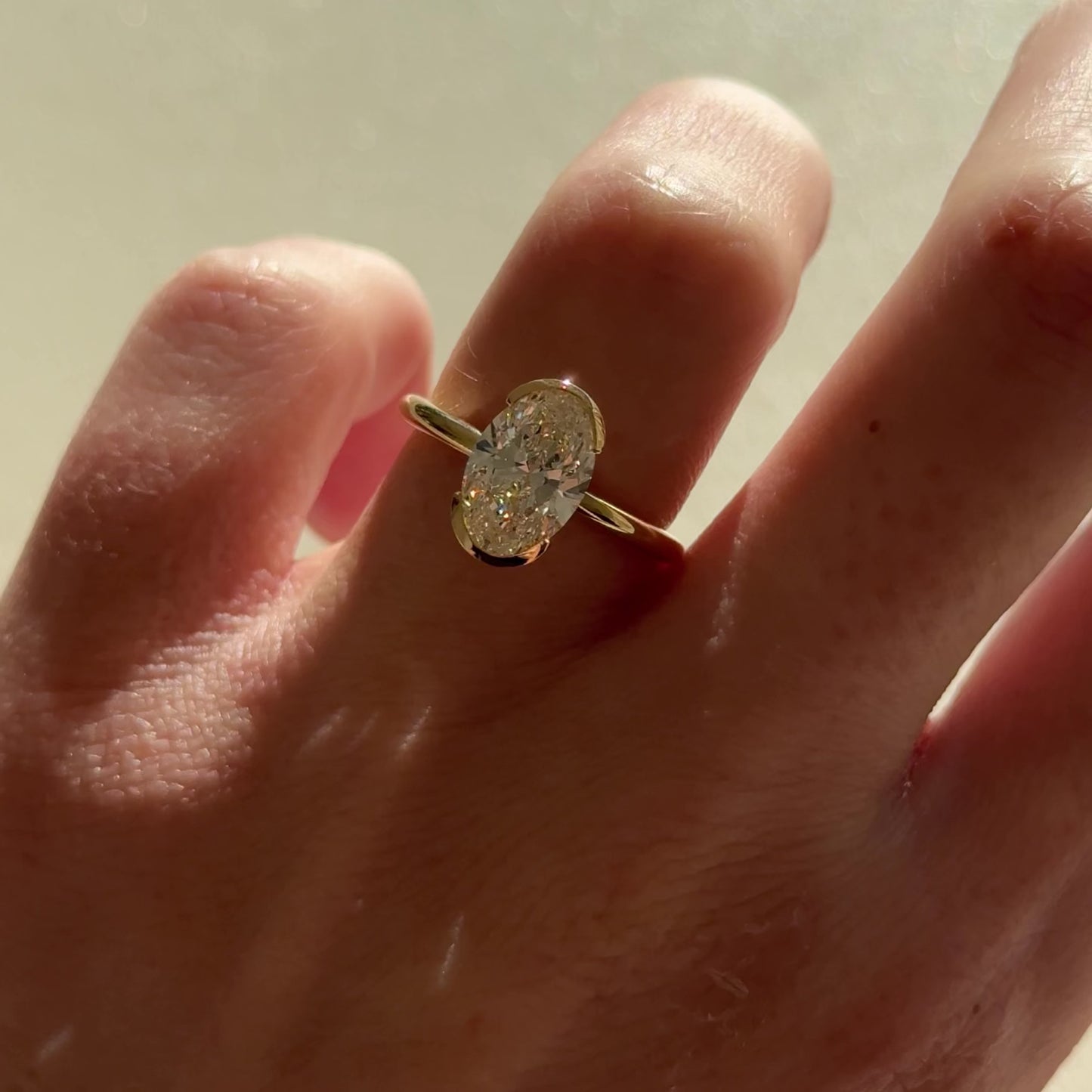 2.02 CT Oval Cut Half Bezel Lab Grown Diamond Engagement Ring