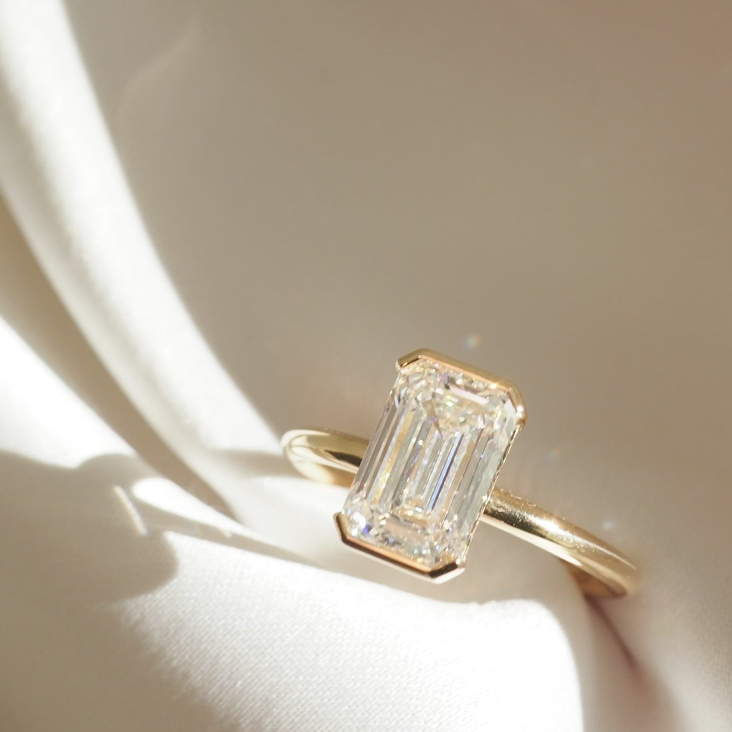 2.11 CT Emerald Cut Half Bezel Lab Grown Diamond Engagement Ring