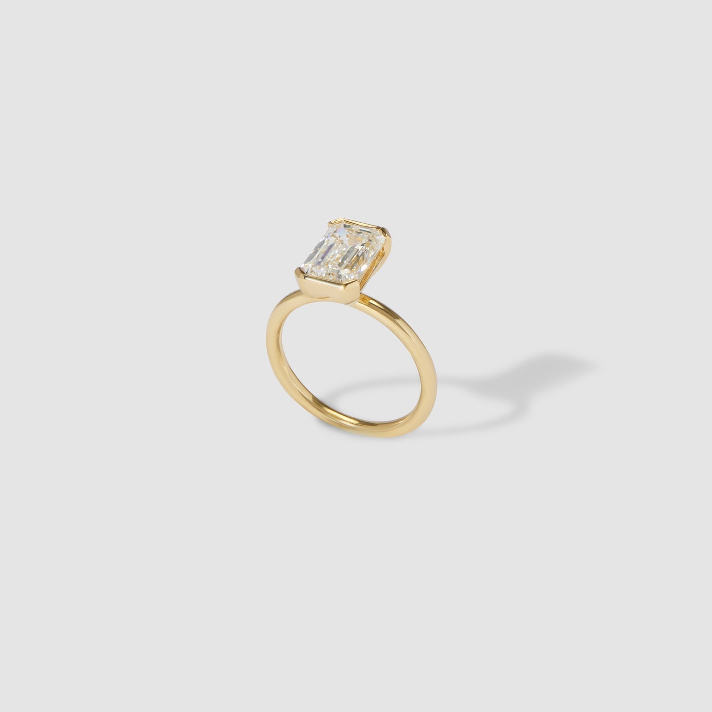 2.11 CT Emerald Cut Half Bezel Lab Grown Diamond Engagement Ring