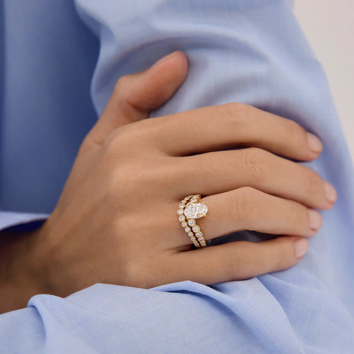 Timeless 1.5 CT Oval Cut Curved Unique Bezel Styled Lab Grown Diamond Engagement Ring