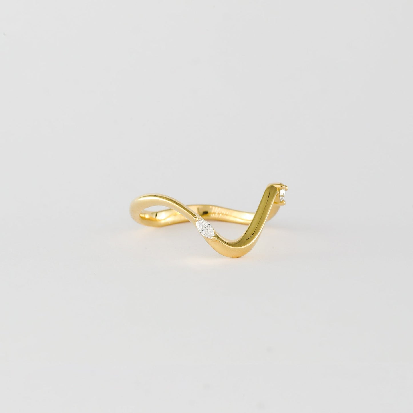 0.07 TCW Round Stone Waved Lab Grown Diamond Wedding Band