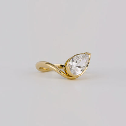 1.54 CT Pear Cut Curved Bezel Lab Grown Diamond Engagement Ring