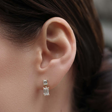 1.2 TCW Emerald Cut Lab Grown Diamond Dangles Earrings in Gold
