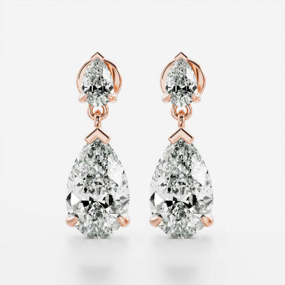 1.2 TCW Pear Cut Lab Grown Diamond Dangles Earrings in Gold