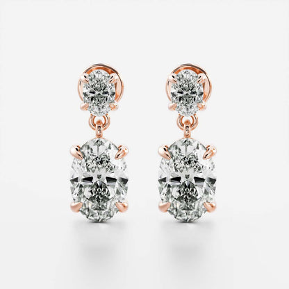 1.2 TCW Oval Cut Lab Grown Diamond Dangles Earrings in Gold