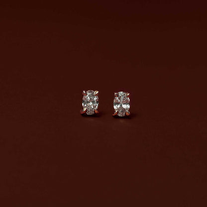 0.50 TCW Oval Cut Moissanite Stud Earrings in Gold