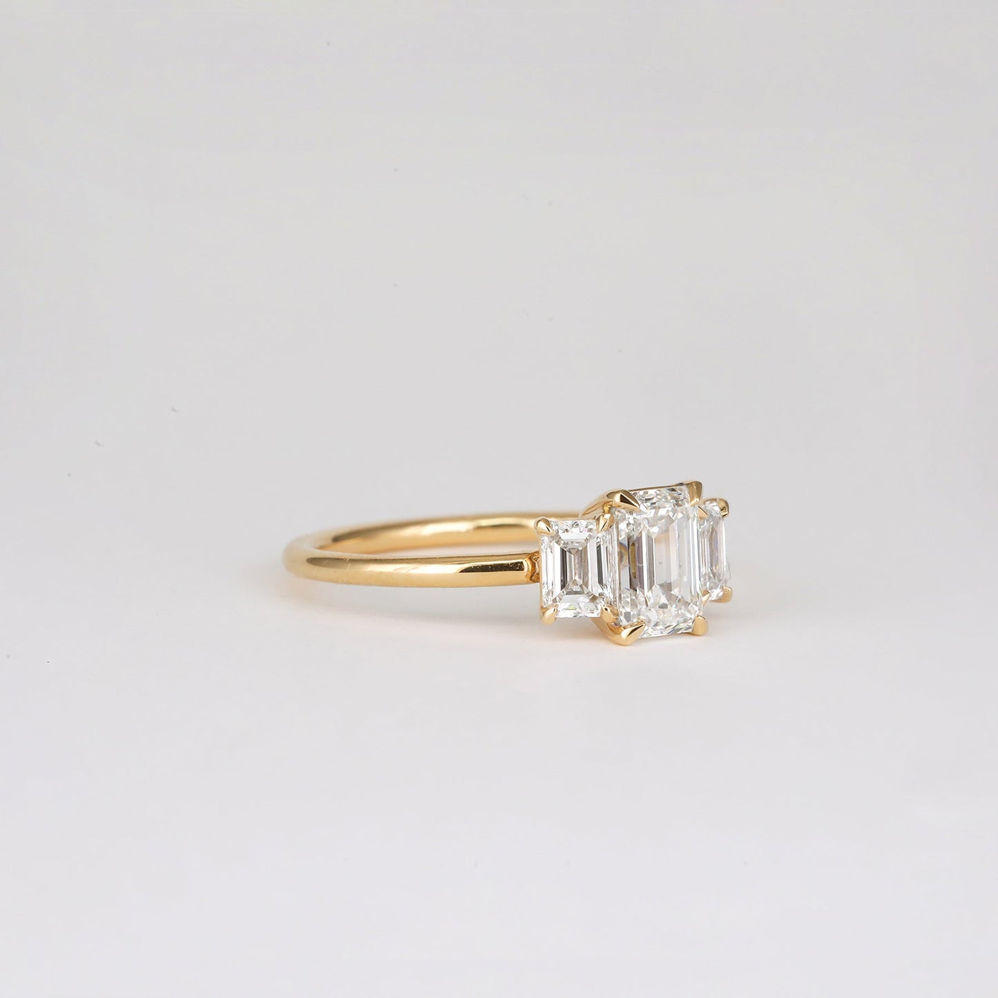 0.90 CT Emerald Shaped Three Stones Lab Grown Diamond Engagement Ring