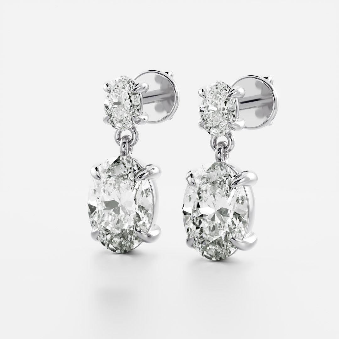 1.2 TCW Oval Cut Lab Grown Diamond Dangles Earrings in Gold