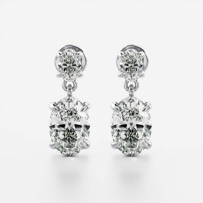 1.2 TCW Oval Cut Lab Grown Diamond Dangles Earrings in Gold