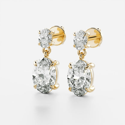 1.2 TCW Oval Cut Lab Grown Diamond Dangles Earrings in Gold