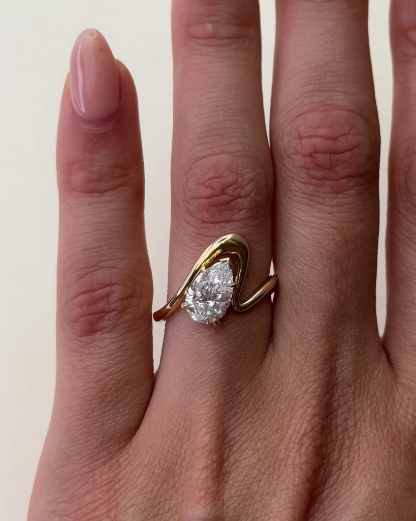 1.54 CT Pear Cut Curved Solitaire Lab Grown Diamond Engagement Ring