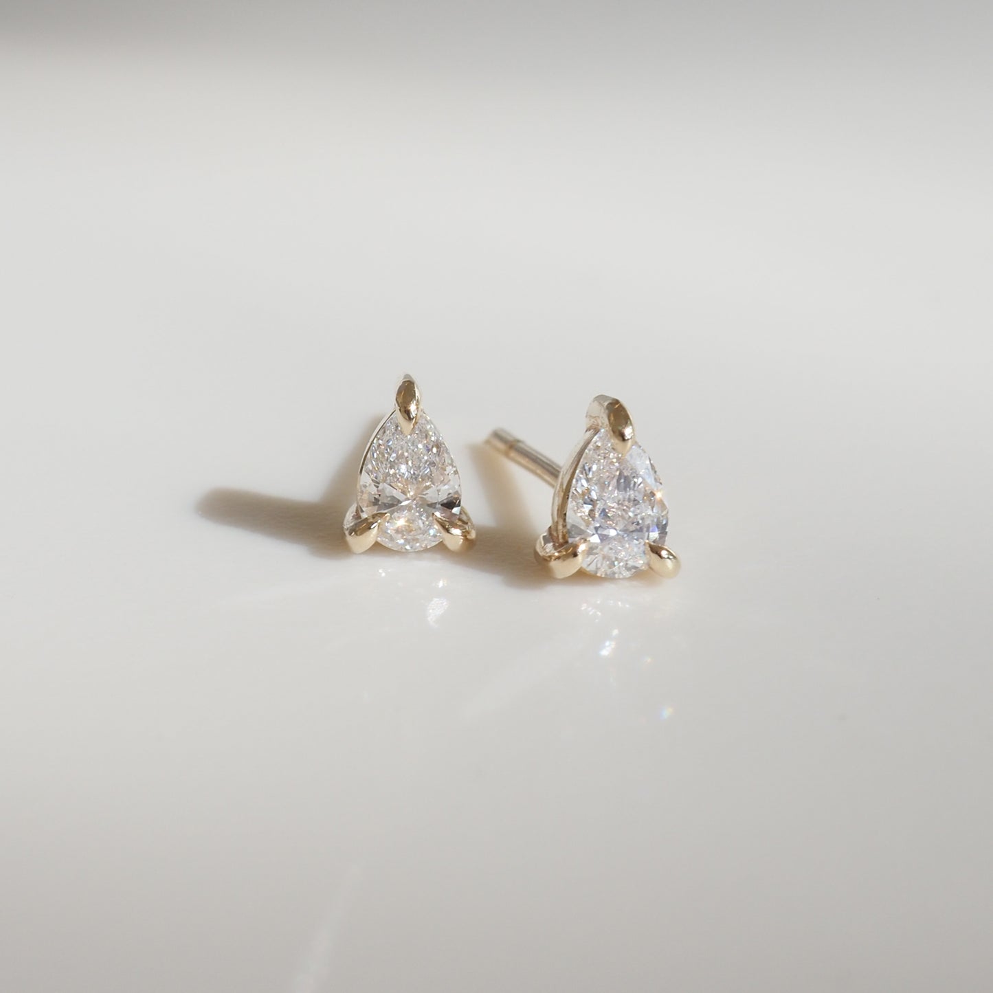 2.0 TCW Pear Cut Moissanite Stud Earrings in Gold 2