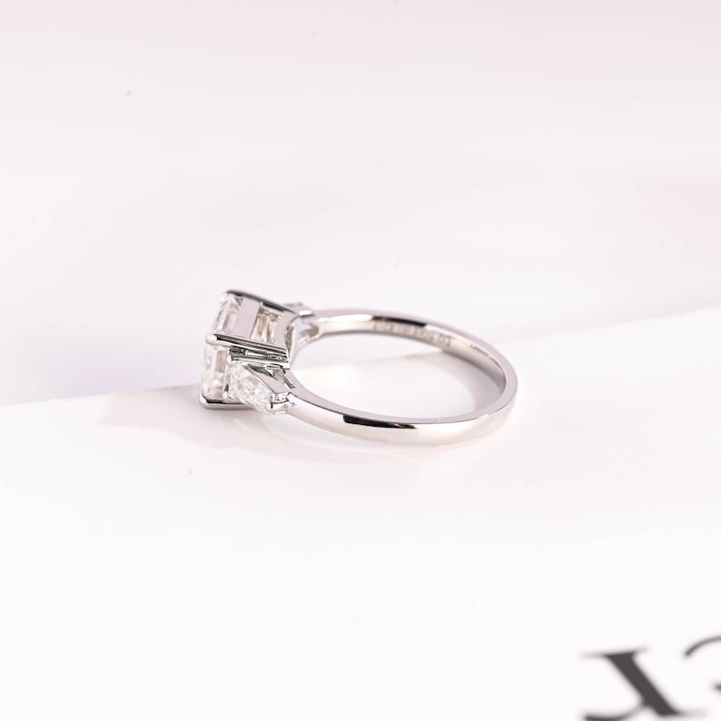 Stunning 1.0 - 2.0 CT Emerald Moissanite Engagement Ring with Three Stone Design 10