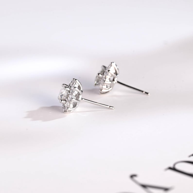 0.50 TCW Round Cut Moissanite Floral Halo Earrings in Gold 10