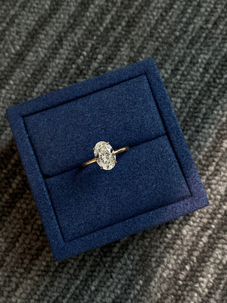 Marquise Shaped Three Stone Lab Grown Diamond Engagement Ring