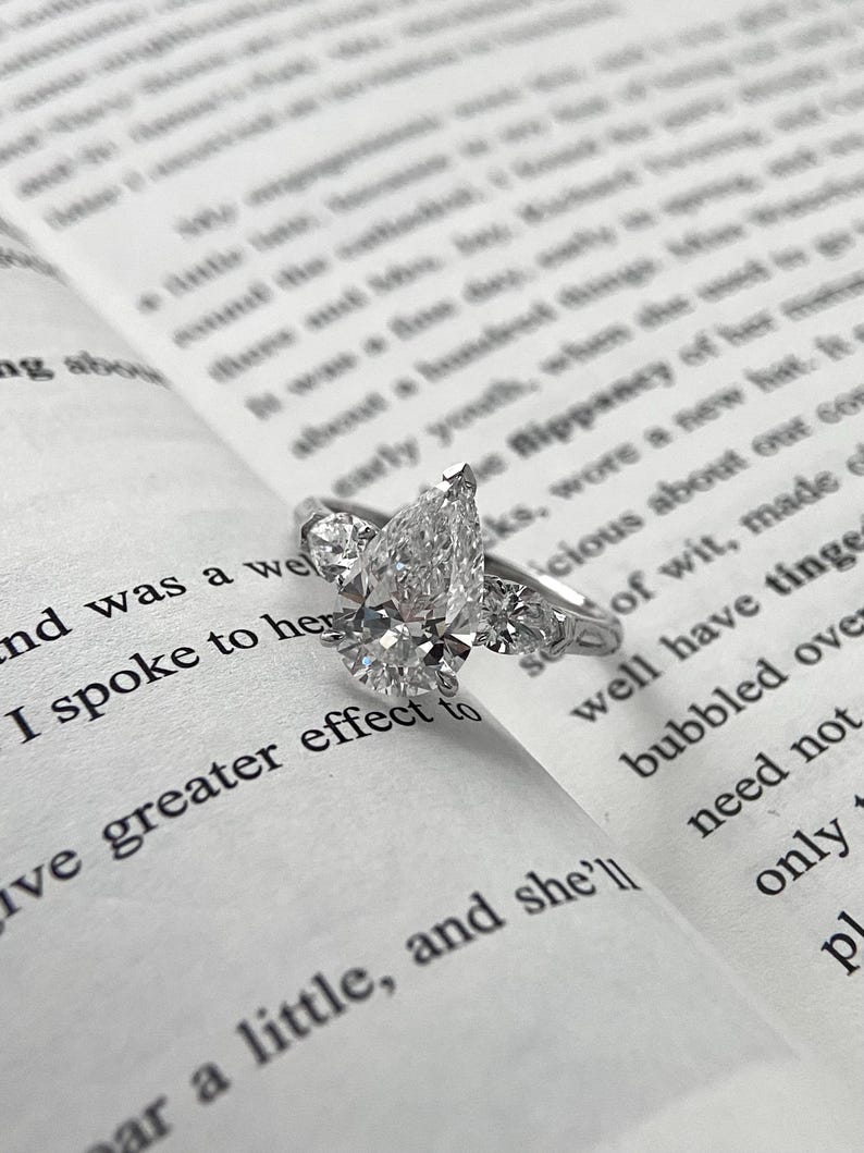 Marquise Shaped Three Stone Lab Grown Diamond Engagement Ring