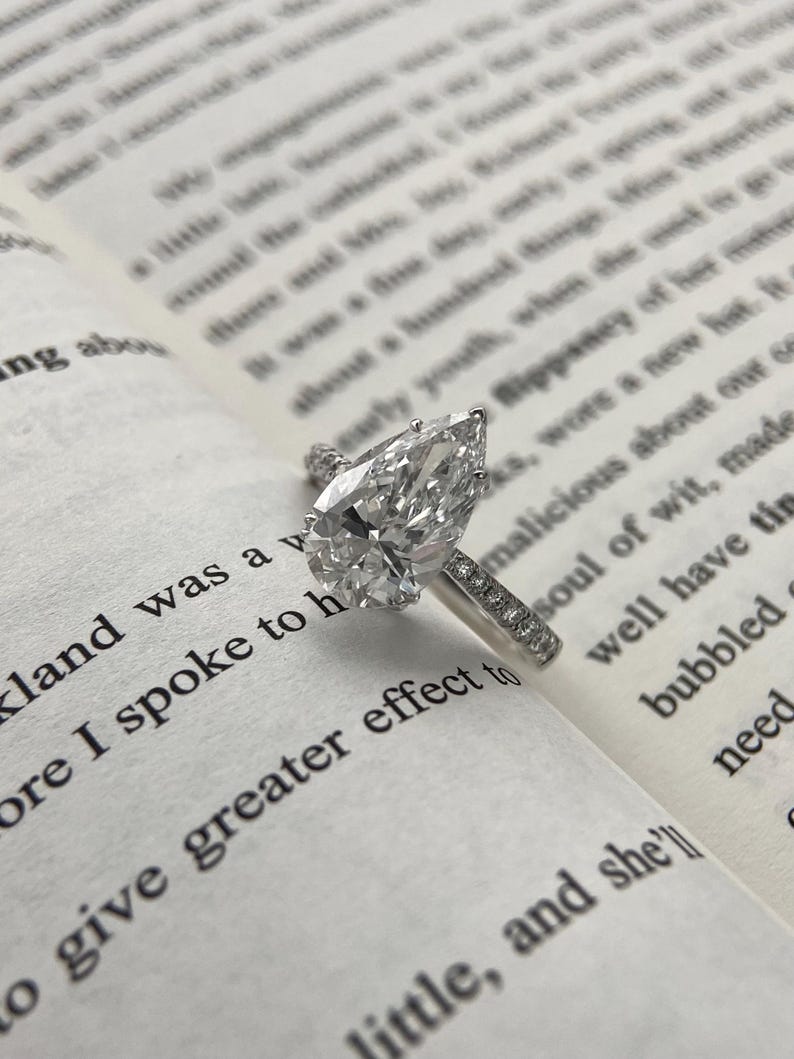 Marquise Shaped Three Stone Lab Grown Diamond Engagement Ring