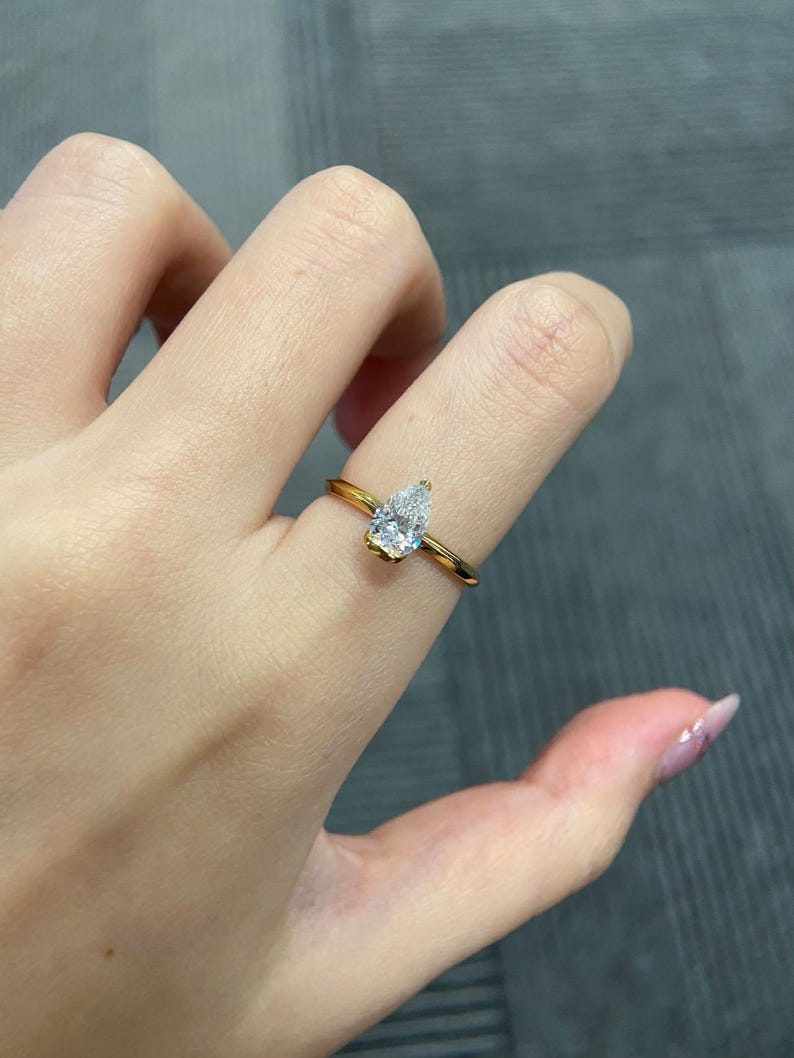 Marquise Shaped Three Stone Lab Grown Diamond Engagement Ring