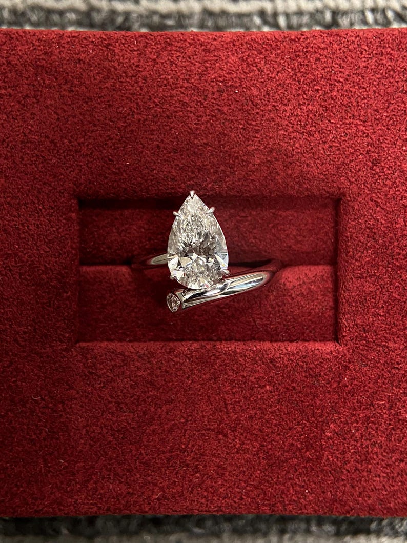 Marquise Shaped Three Stone Lab Grown Diamond Engagement Ring