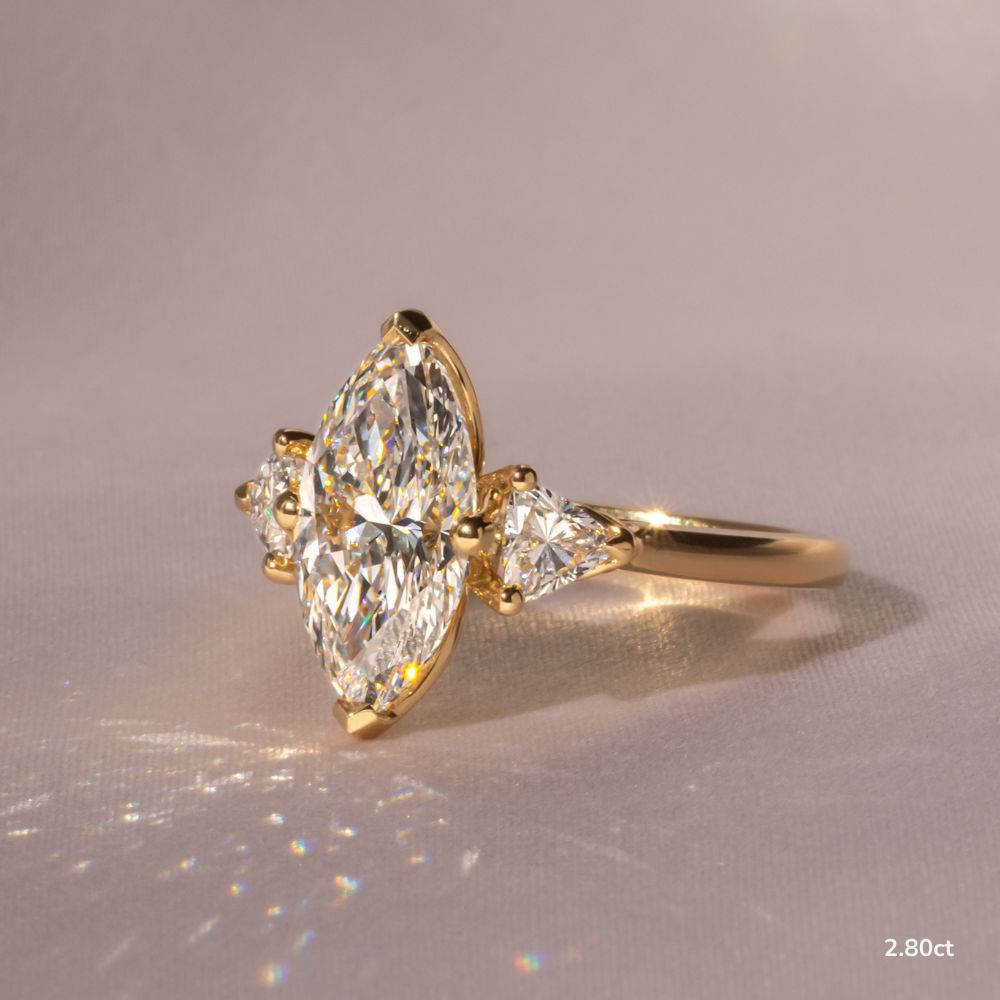Marquise Shaped Three Stone Lab Grown Diamond Engagement Ring