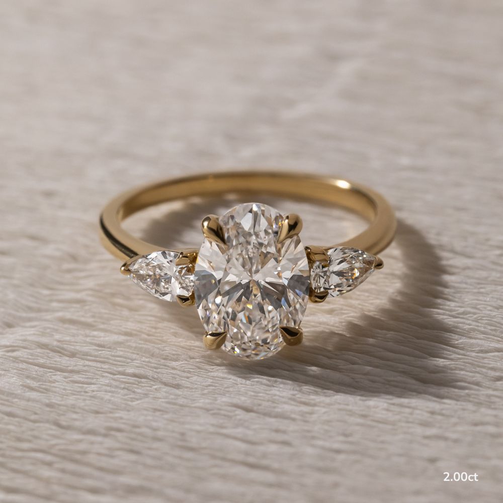 Marquise Shaped Three Stone Lab Grown Diamond Engagement Ring